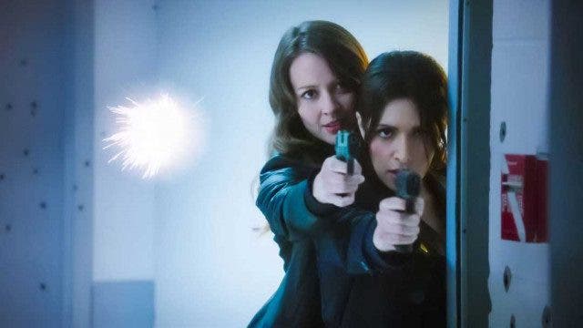 Root and Shaw disparando